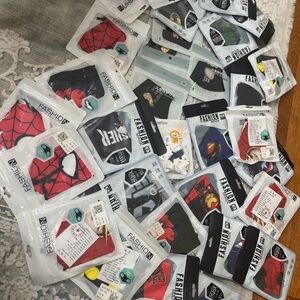 Assorted Fashion Face Masks.Adult and kids mixed.32 seperate packs